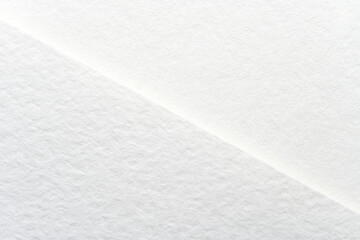 Obraz premium Minimalist white paper texture background for design projects and creative inspiration.
