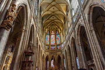 Naklejka premium St. Vitus Cathedral Gothic Nave Facing Main Altar and Stained Glass Windows In Prague Castle in Prague, Czech Republic.