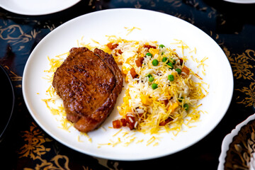 Authentic Brazilian food, grilled picanha steak with birobiro rice