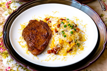 Authentic Brazilian food, grilled picanha steak with birobiro rice