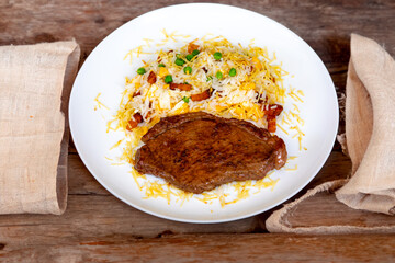 Authentic Brazilian food, grilled picanha steak with birobiro rice