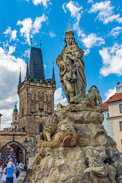 View of Lesser Town Bridge Tower and Statue of Saint Vitus From Charles Bridge in Prague, Czech Republic.
