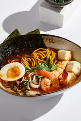 Vibrant Tofu and Shrimp Ramen Bowl in Bright Studio Lighting
