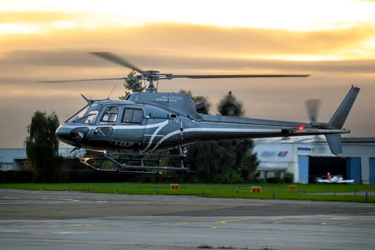 Airbus Helicopters H125 (AS350 B2) Ecureuil helicopter arriving at Paris-Saclay-Versailles Airport. Toussus-le-Noble, France - Oct 13, 2024