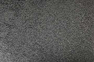 abstract black background. black background painted with roller