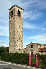 Fototapeta premium Stone, monumental church with bell tower on Lake Garda