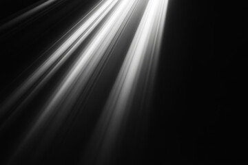 light striking through a dark background