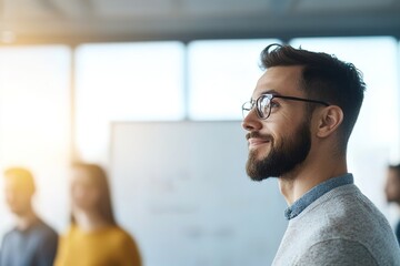 Inspirational leader looking forward, team in background