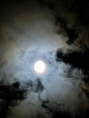full moon over the clouds