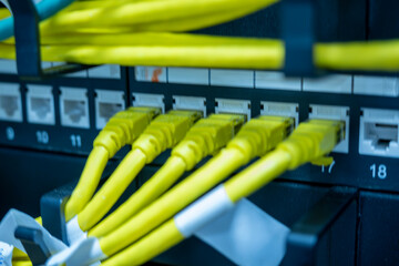 Detail shots of the server room. Firewall, fiber and RJ-45 cable image. Close-up Server. Cybersecurity and server concept. Fiber Internet, RJ45 Cable and detailed server images.