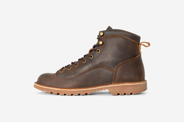 Brown leather boots on white background. Fashion 