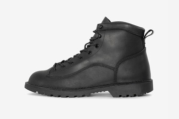 Black leather boots isolated on white background. Classic fashion footwear for everyday, hiking, outdoor activities, autumn and winter seasons.