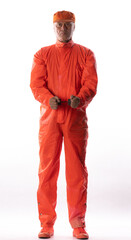 portrait of a man prisoner in orange robe in handcuffs