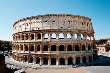 Obraz premium Vintage-style ruins of a Roman amphitheater, depicted with old-fashioned sepia tones