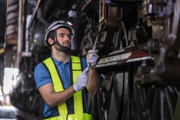 Engineer checking construction process railway and checking work on railroad station . Railway...