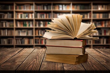 Fototapeta premium Reading Books set on wooden table in library
