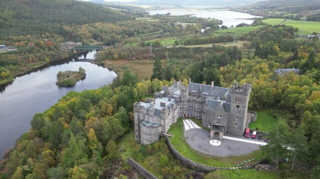 carbisdale castle set against backdrop river valley scotland's highlands castle's upward aerial drone forest kyle sutherland background scenic nature landscape exploration journey 