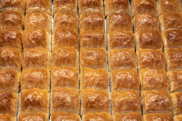 Tasty baklava, traditional Turkish dessert, background.