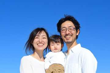 Fototapeta premium 笑顔の家族と青空, 赤ちゃん