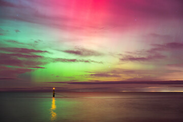 aurora borealis, northern lights above baltic sea in poland, stegna, october 2024