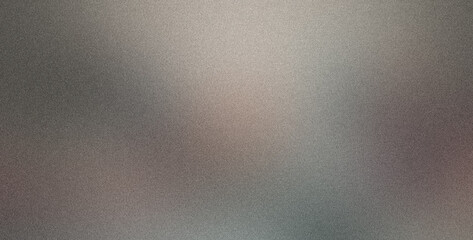 Obraz premium Textured background with a grainy gradient transitioning from gray to silver, resembling a metallic finish with a hint of grunge and roughness