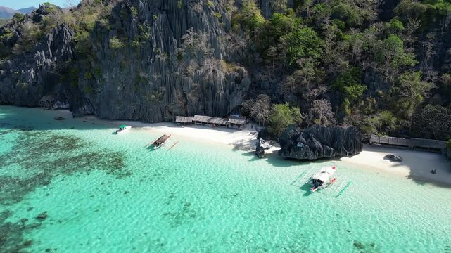 Beautiful white beach remote tropical island Banul Beach Coron Philippines