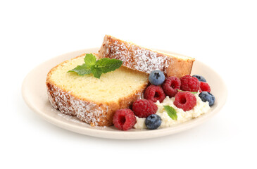 Freshly baked sponge cake, whipped cream, berries and mint isolated on white