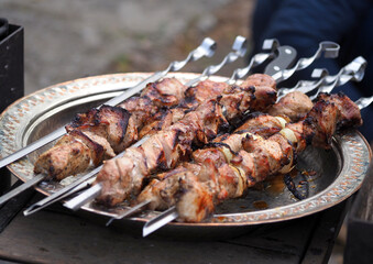 Appetizing cooked shashlik on a beautiful dish