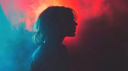 Silhouette of a woman profile in red and blue lighting, artistic and moody concept