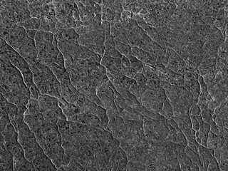 Gray weathered cracked wall background 