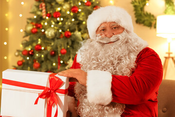 Santa Claus with gift at Christmas night