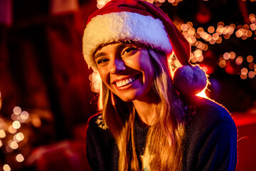 Fototapeta premium Photo of nice young girl cheerful smile wear christmas clothes garland light home party decoration interior room