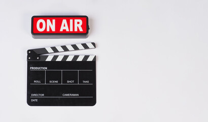 clapper board with on air sign on white background.