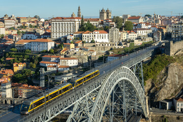 Porto City and Dom Luis Bridge I with Tram in Morning. View from Tourist Viewpoint Miradouro da...