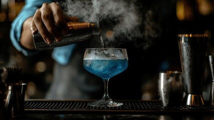 Mixing a vibrant blue cocktail with smoke at a stylish bar during a lively evening