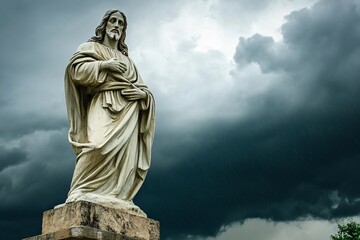 Fototapeta premium A dramatic shot of the Jesus statue against stormy skies 2