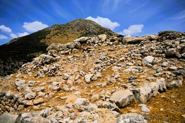 Remains of the fortification walls of Mycenae on Peloponnese in Greece. Mycenae was one of the largest citadels in Ancient Greece during the Bronze Age and played an important role in the Trojan War