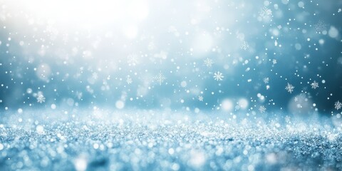Fototapeta premium Beautiful winter scene with snowflakes gently falling against a serene light blue background evoking a sense of calm and tranquility