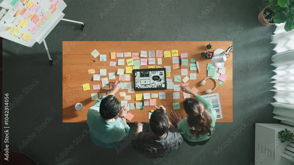 Poster time lapse of creative designer working together brainstorming idea by using sticky notes at meeting