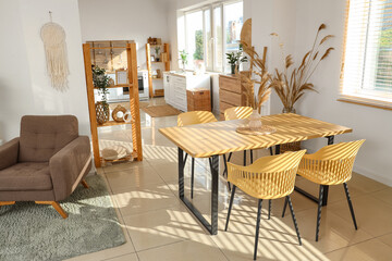 Interior of modern studio apartment with dining table