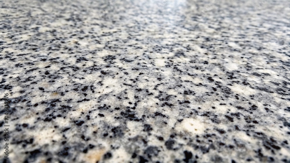 Poster dark gray stone granite background with rock texture from a low angle view