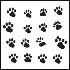 Fototapeta premium Dog paw prints vector silhouette