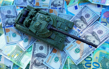 Tank on banknotes background. Currency war. War costs, military spending. Making money from war. Money laundering on War. Military economy. Military tank on European banknotes, Dollars. Weapons sales.