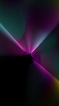 desde centro magenta y luego c&iacute;an colores de luces que giran formato vertical