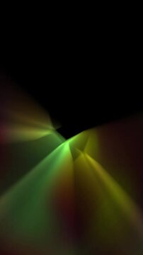 luces rotando amarillas, verdes, naranja formato vertical sobre negro