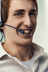 Smiling customer service representative wearing headset