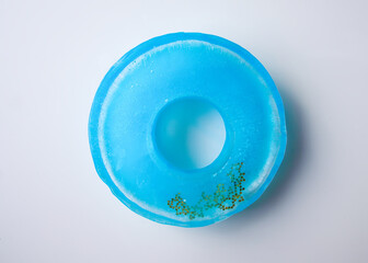 Colorful ice painted by watercolor paints. Winter kid's activities.