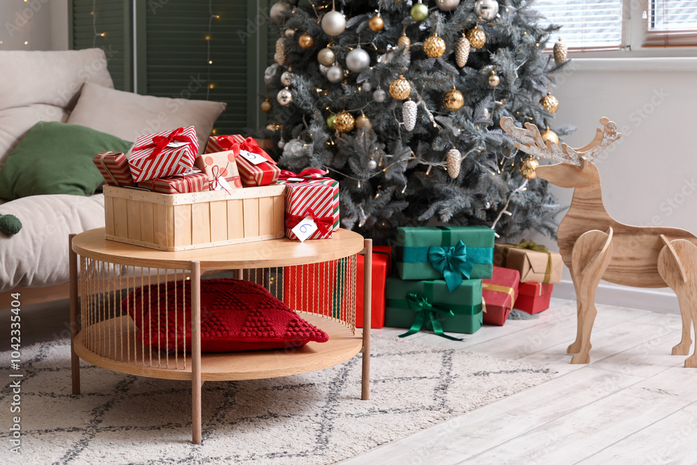 Wall mural Box with Christmas Advent calendar on table in living room interior