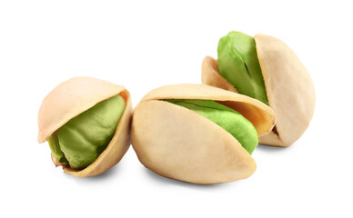 Three tasty pistachio nuts on white background