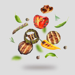 Tasty grilled vegetables in air on light grey background